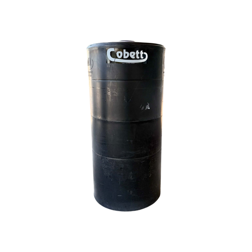 USA Grazing Systems Cobett Model SB black cylindrical livestock waterer standing on a concrete outdoor surface