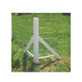 USA Grazing Systems Timeless New Zealander A-Frame corner post supporting high-tensile wire fencing in a green pasture.