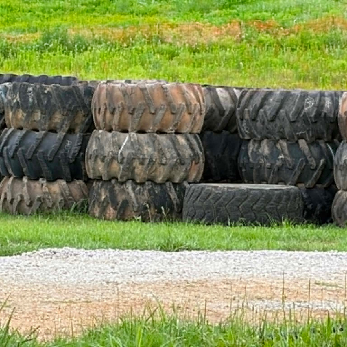 USA Grazing Systems Tire Tank repurposed industrial tires stacked in a field for livestock watering