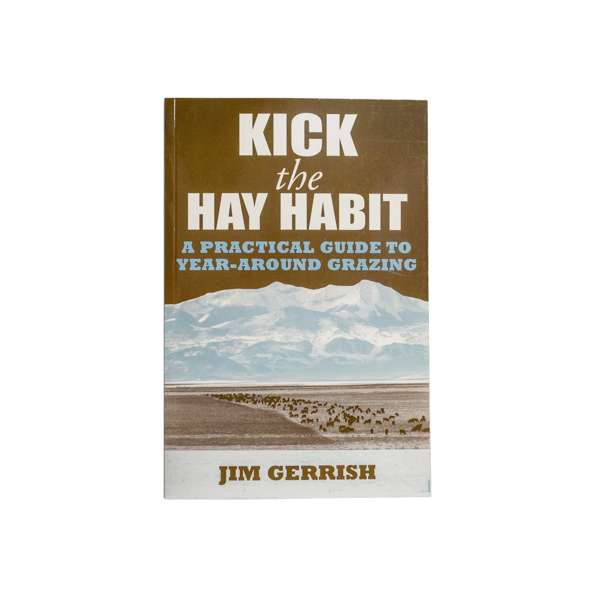 USA Grazing Systems book Kick the Hay Habit by Jim Gerrish featuring a landscape cover with mountains and cattle