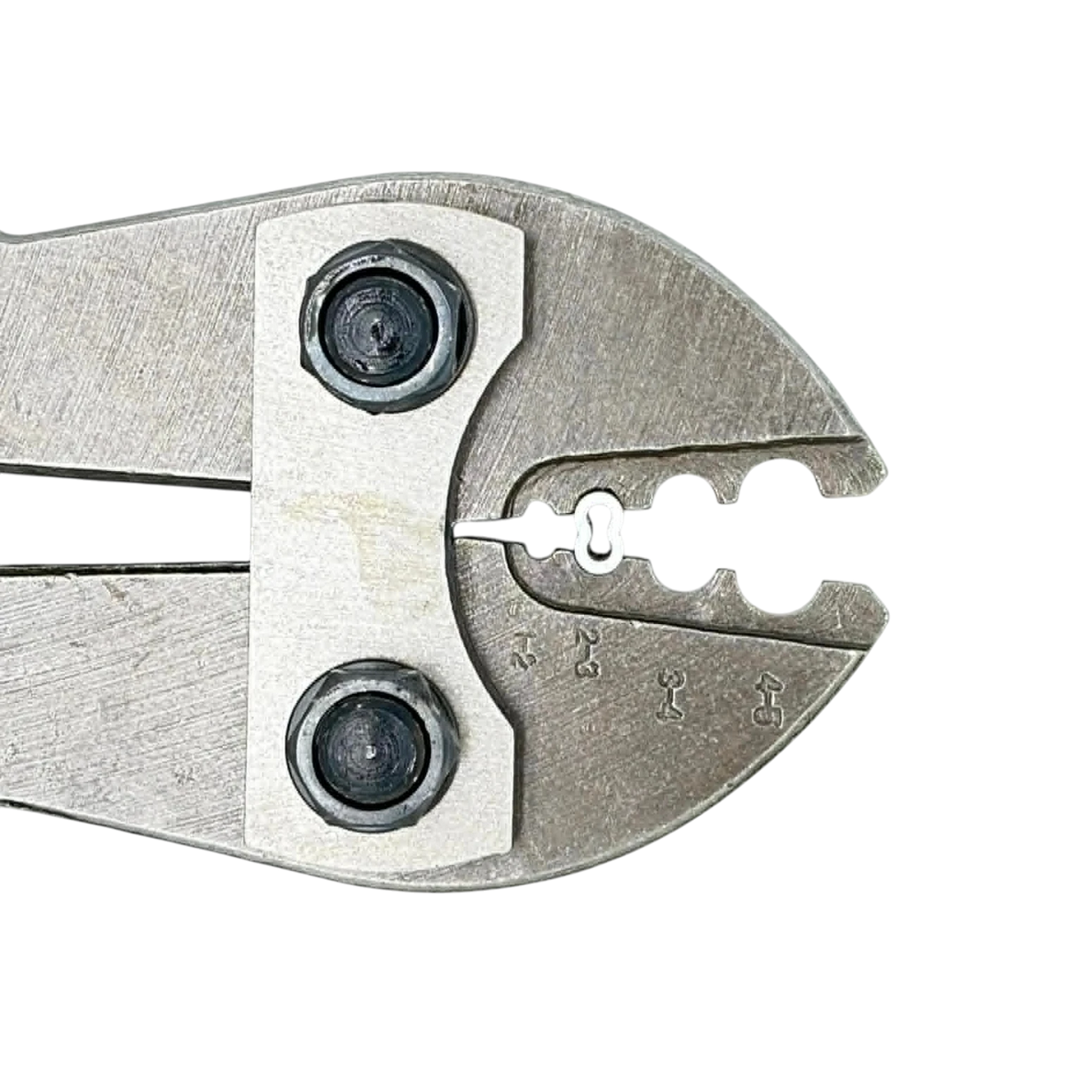 USA Grazing Systems Kiwi C2L long crimp sleeve positioned in a metal crimping tool for hi-tensile fencing wire