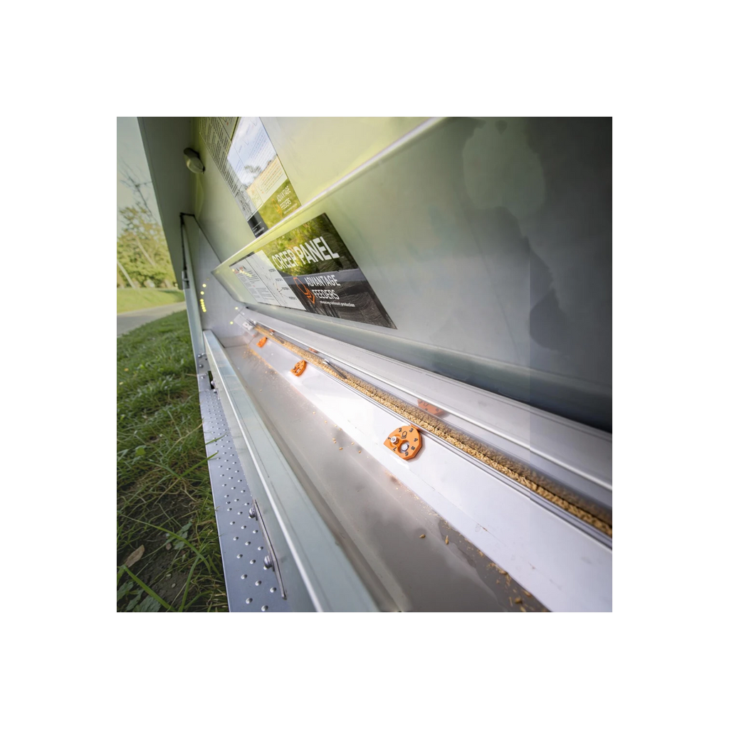 USA Grazing Systems orange cam adjusters installed on an Advantage grain feeder for precise feed control.