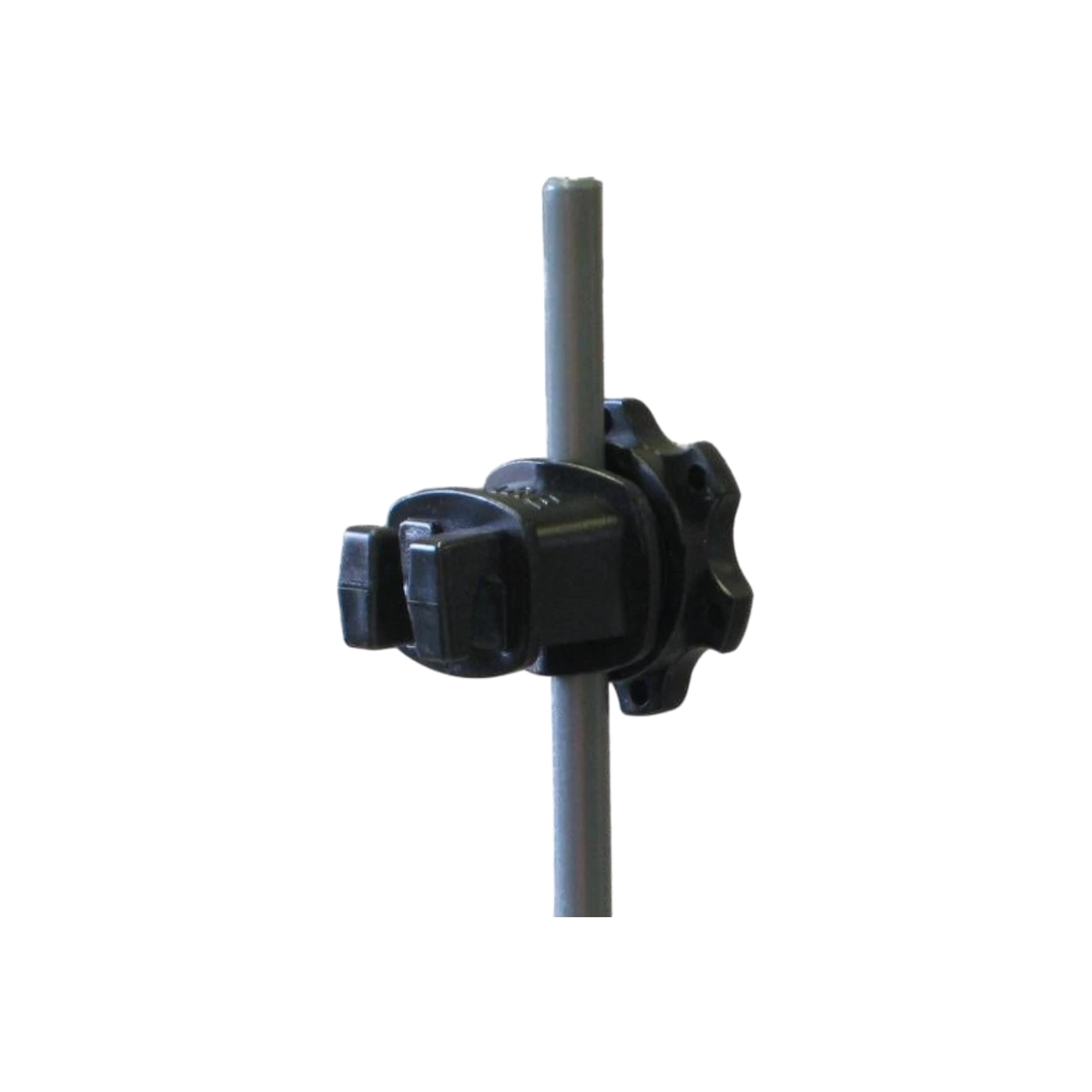 USA Grazing Systems black round post insulator attached to a grey fence post for electric fencing.
